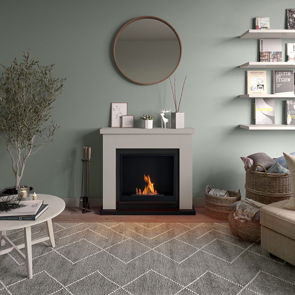 Living room with a fireplace, shelves, and decorative items.