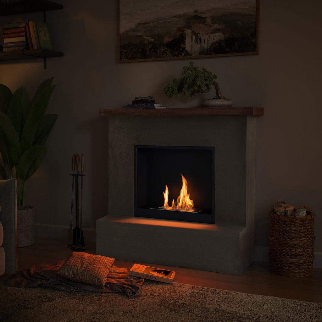 Cozy living room with a fireplace, plants, and books in a dimly lit setting.