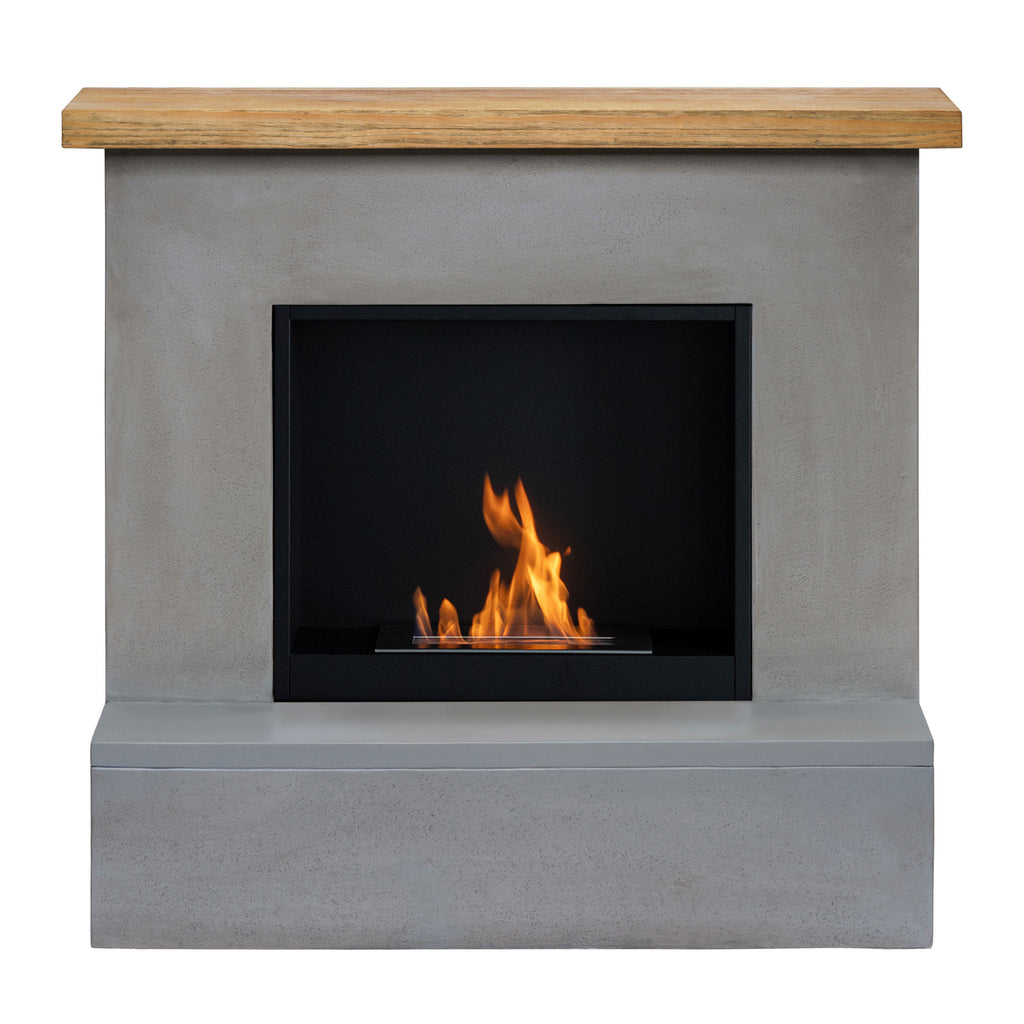 Modern fireplace with concrete surround and wooden mantel on a white background