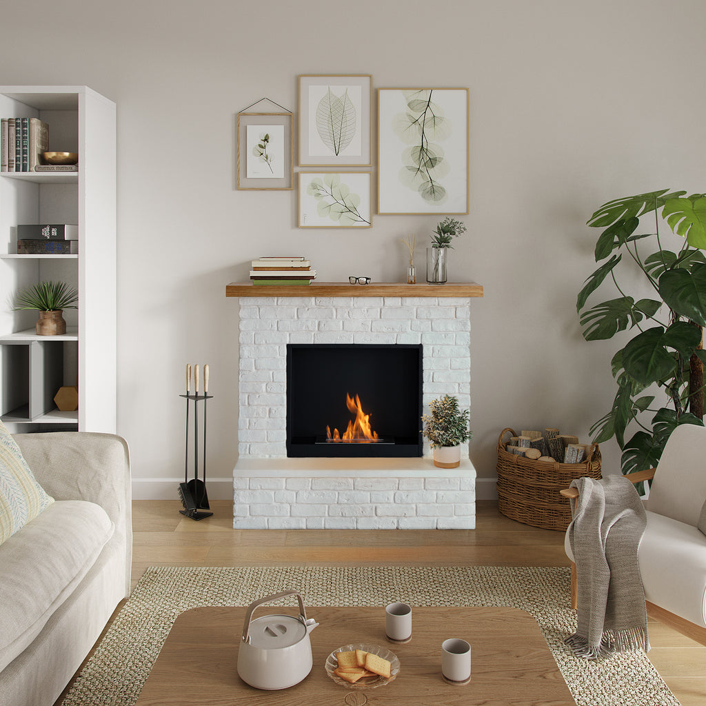 Modern living room with a fireplace, books, and decorative items.