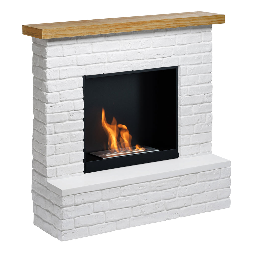 White brick fireplace with wooden mantel and fire burning inside